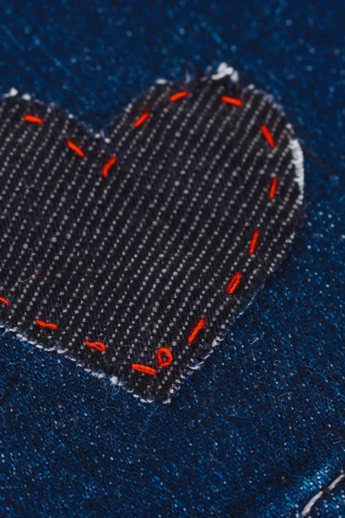 how to remove an iron on patch black heart on blue jeans