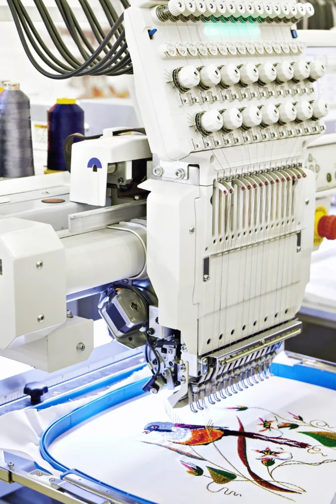 image of an embroidery machine working on a bird design