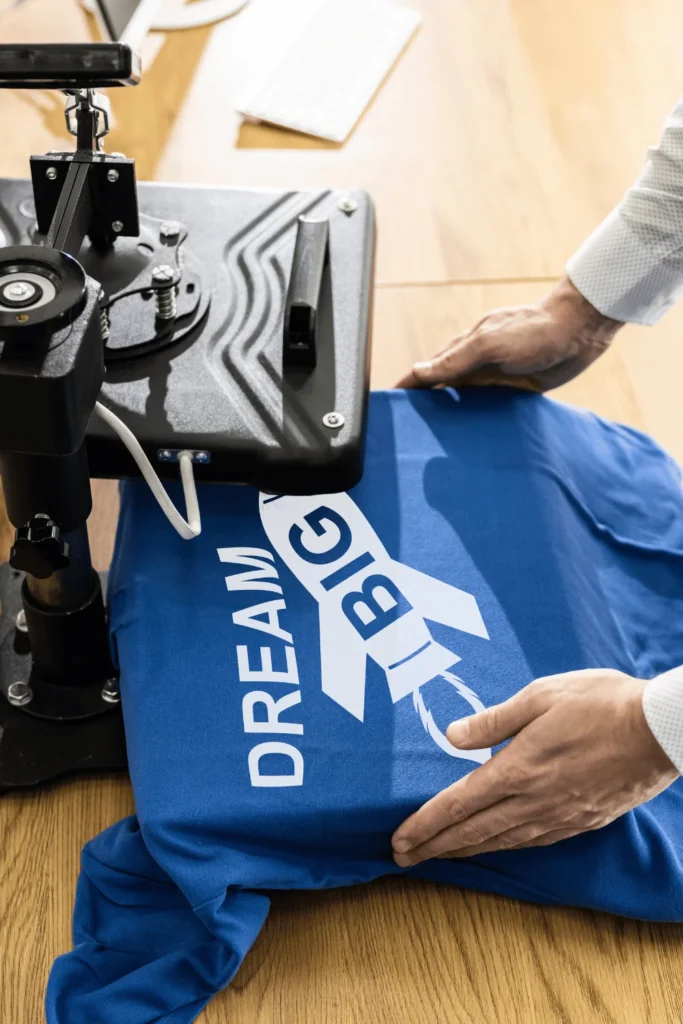image of man with blue shirt sublimation printing vs DTG