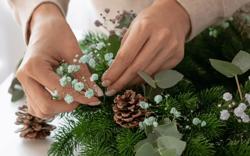images of a woman making a wreath