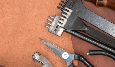 image of leather with tools in front of it