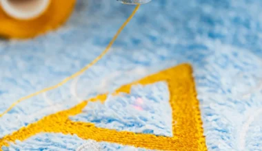 Blue towel in hoop of Embroidery Machine